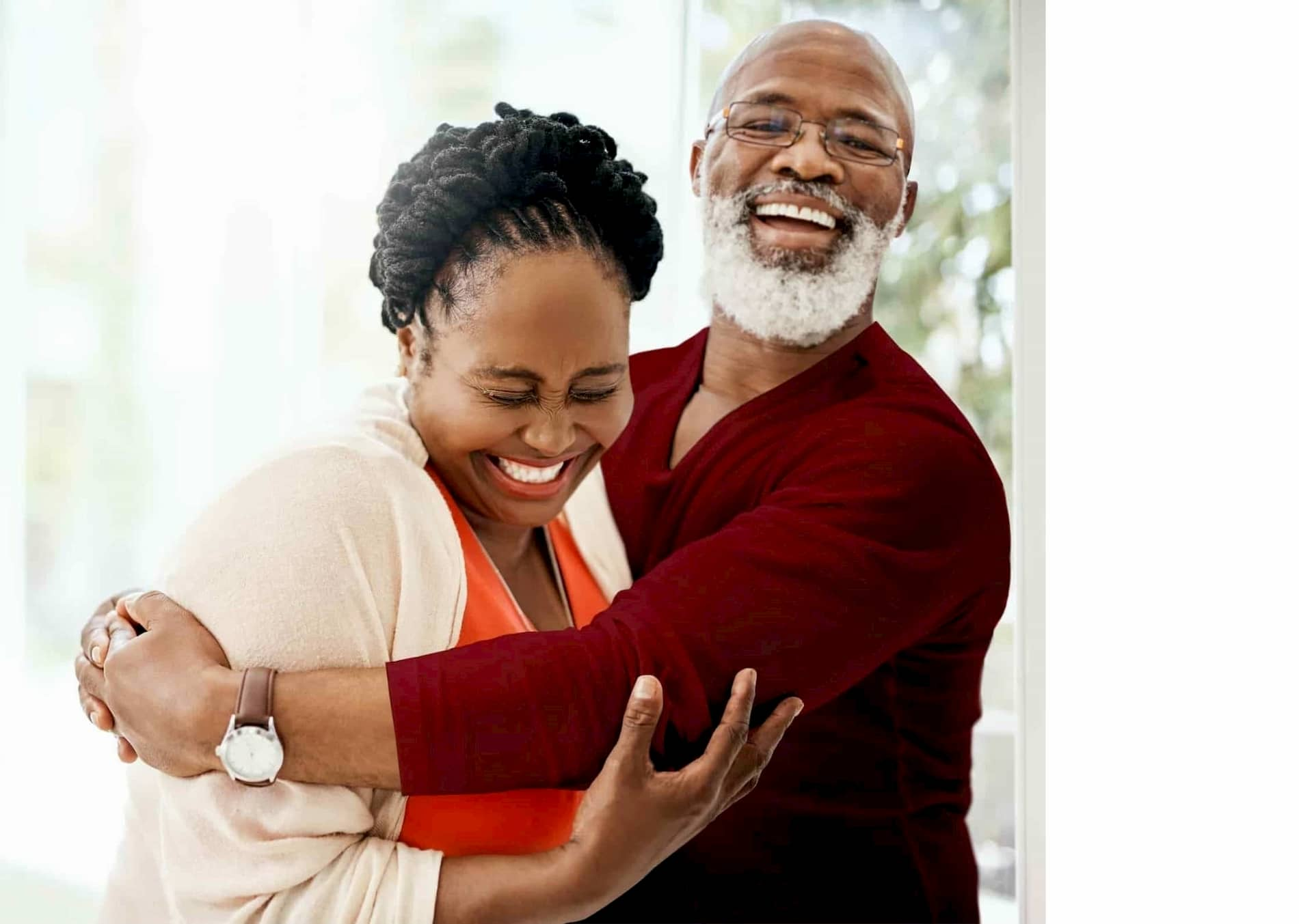 Smiling older couple.